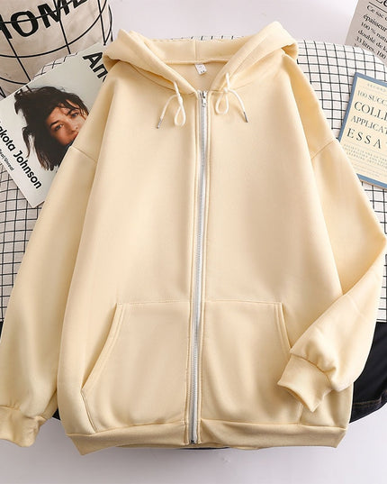 Damska bluza oversize z kapturem zapinana na suwak