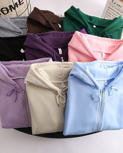 Damska bluza oversize z kapturem zapinana na suwak