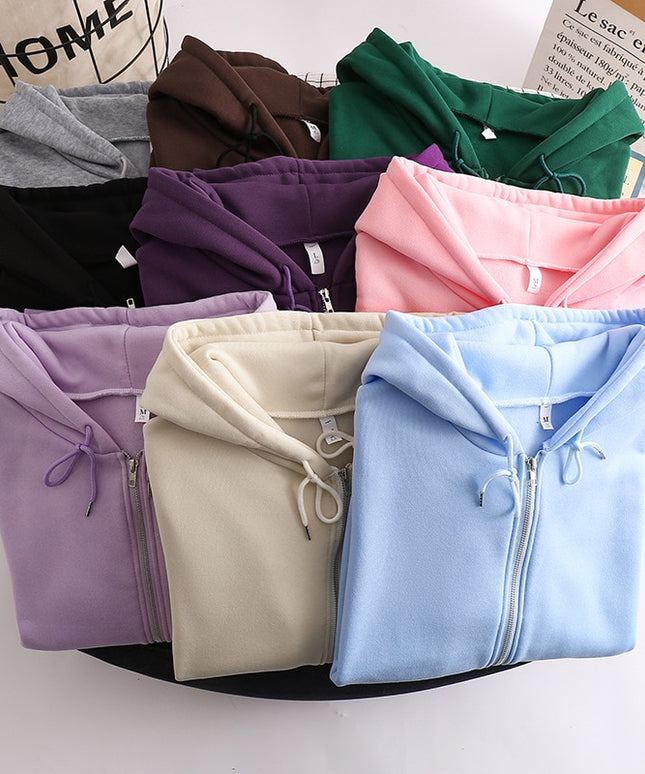 Damska bluza oversize z kapturem zapinana na suwak