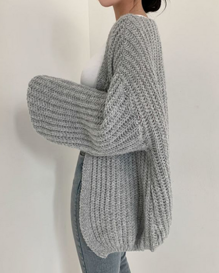 Damski sweter typu kardigan dziergany o kroju oversize