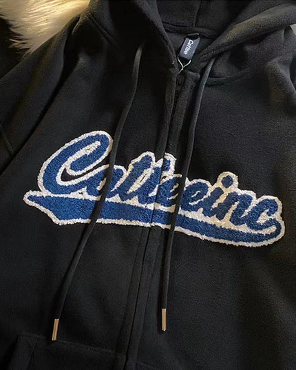 Damska bluza zapinana na zamek z naszywanym napisem