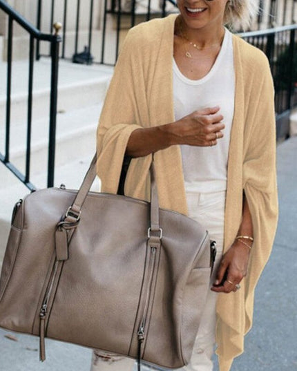 Damski sweter typu kardigan o kroju ponczo