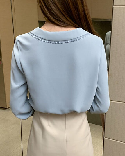 Damska koszula zapinana na perłowe guziki