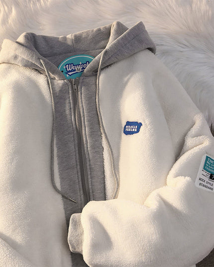 Damska bluza polarowa z kapturem zapinana na suwak