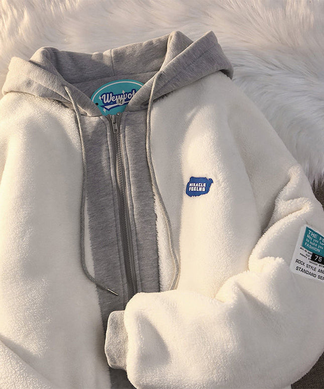 Damska bluza polarowa z kapturem zapinana na suwak