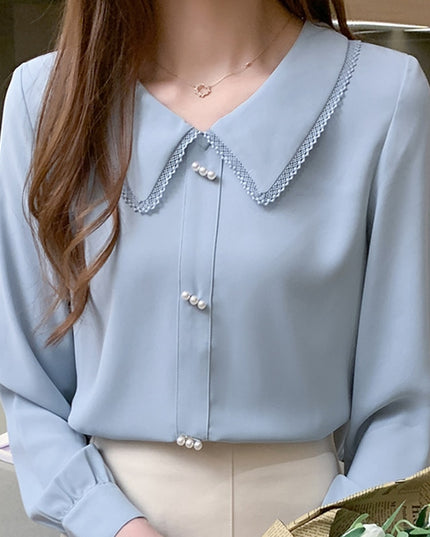 Damska koszula zapinana na perłowe guziki