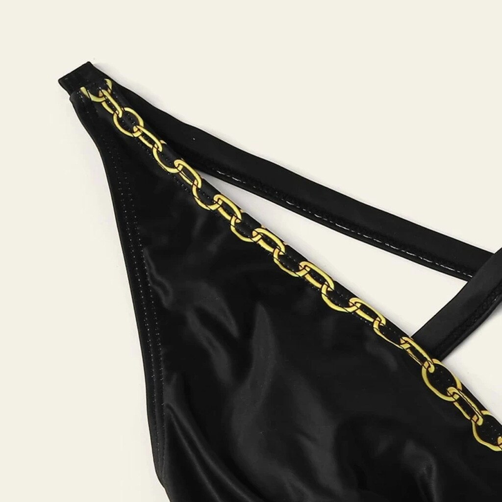 Damski jednoczęściowy strój kąpielowy monokini z odkrytymi plecami i motywem łańcuszka