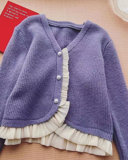 Damski sweter typu kardigan z falbanką