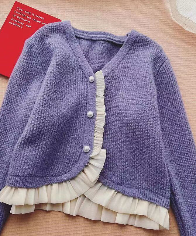 Damski sweter typu kardigan z falbanką