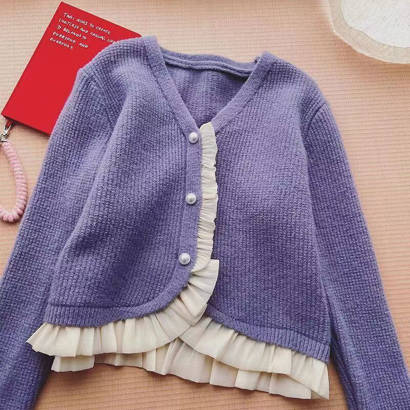 Damski sweter typu kardigan z falbanką
