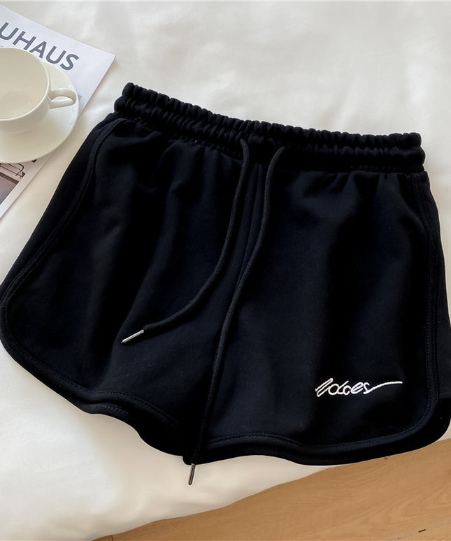 Damskie szorty sportowe z wyszywanym napisem