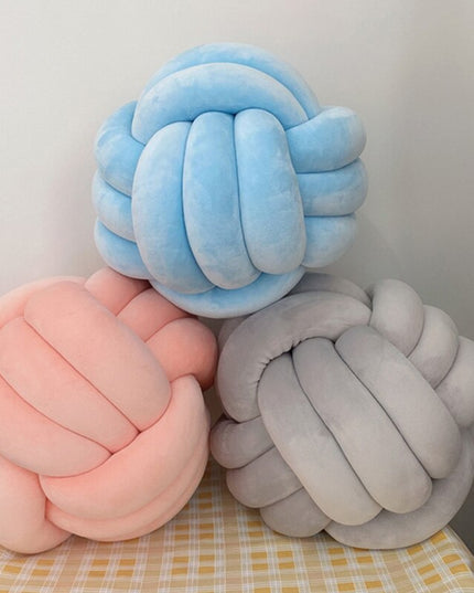 Poduszka dekoracyjna węzeł w pastelowych kolorach