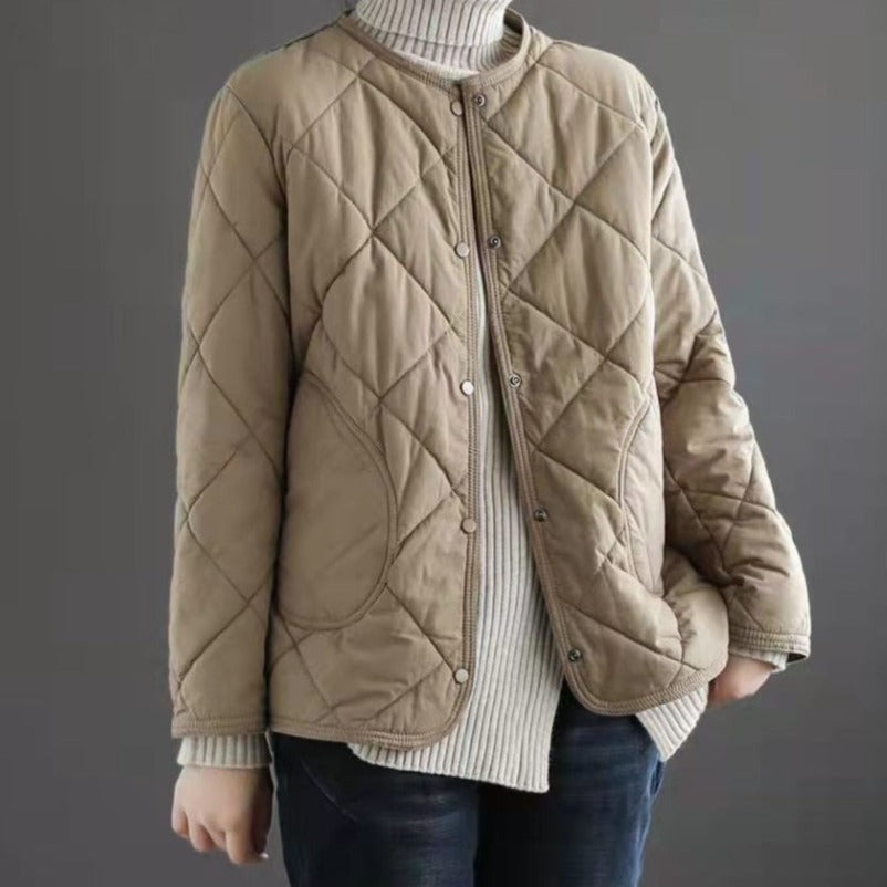 Damska kurtka przejściowa pikowana zapinana na zatrzaski