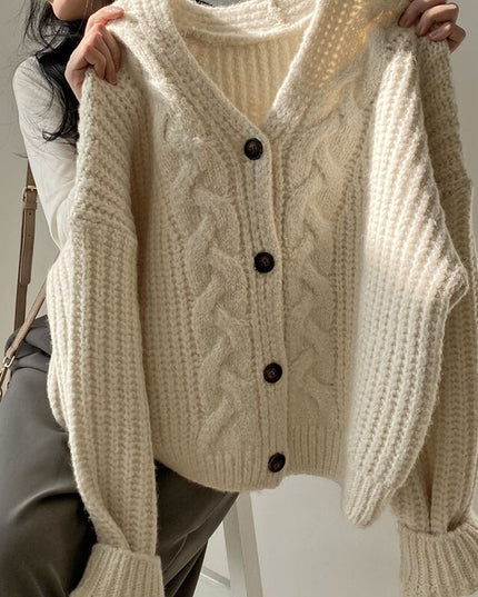 Damski sweter dziergany typu kardigan zapinany na guziki