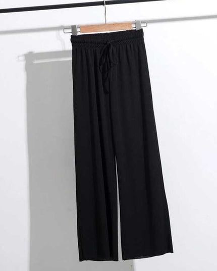 Damskie spodnie z wiązaniem i szerokimi nogawkami
