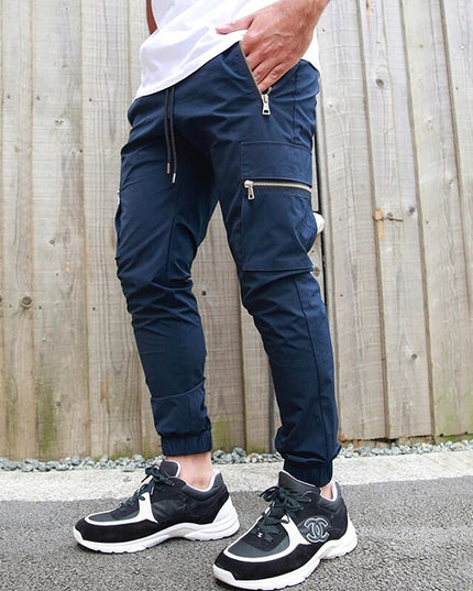 Męskie spodnie bojówki z kieszeniami na suwak
