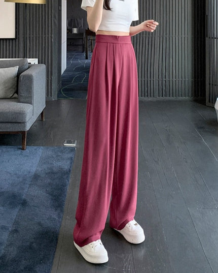 Damskie spodnie materiałowe taliowane z szerokimi nogawkami