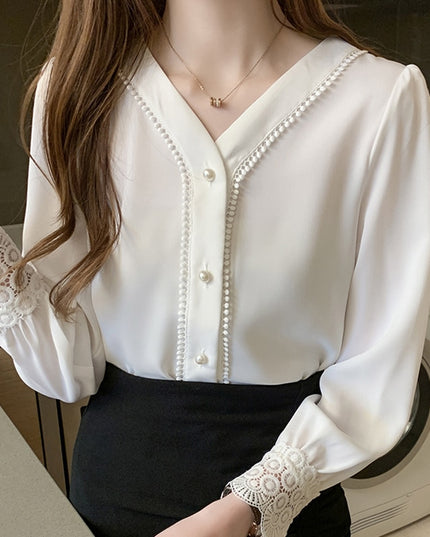 Damska koszula z ażurowymi rękawami