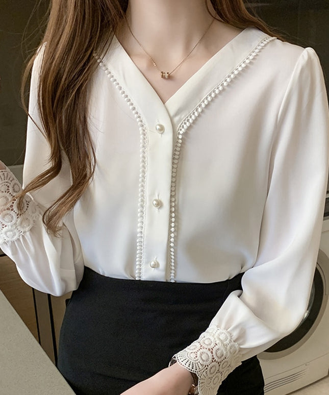 Damska koszula z ażurowymi rękawami