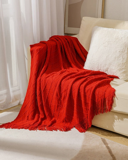 Koc z frędzlami i fakturą w romby