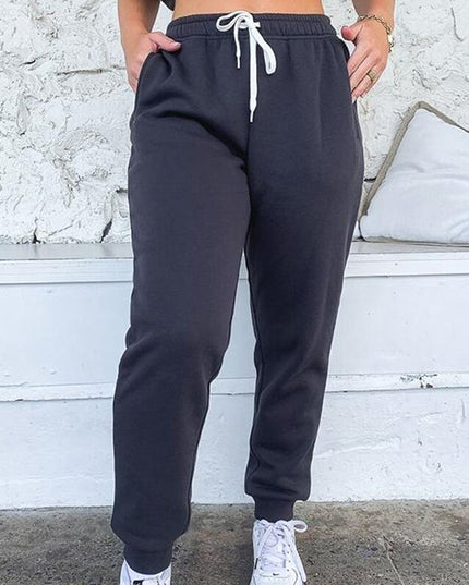 Damskie spodnie dresowe z wiązaniem i wysokim stanem