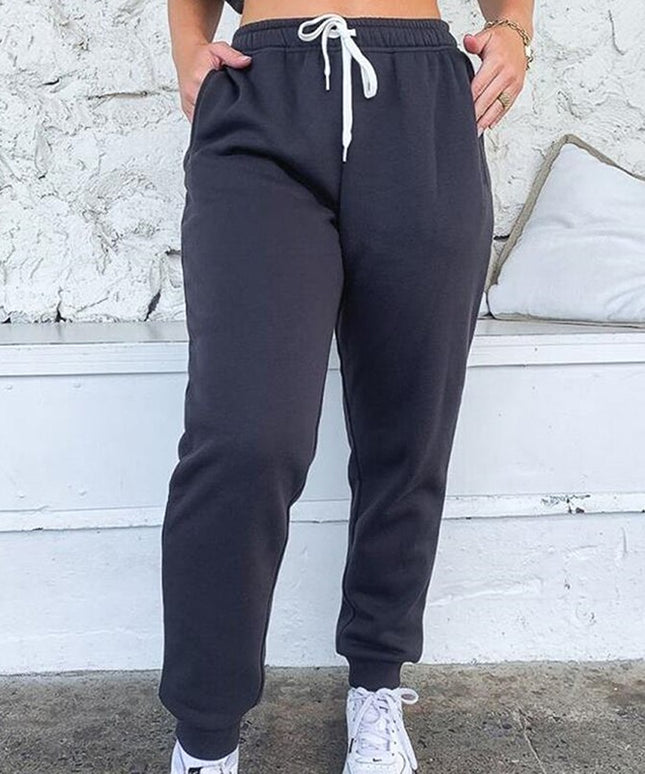 Damskie spodnie dresowe z wiązaniem i wysokim stanem