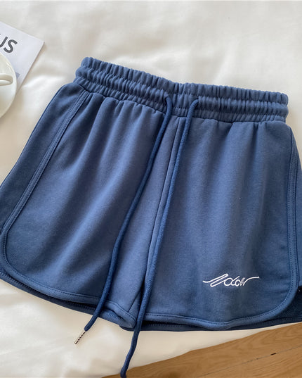 Damskie szorty sportowe z wyszywanym napisem