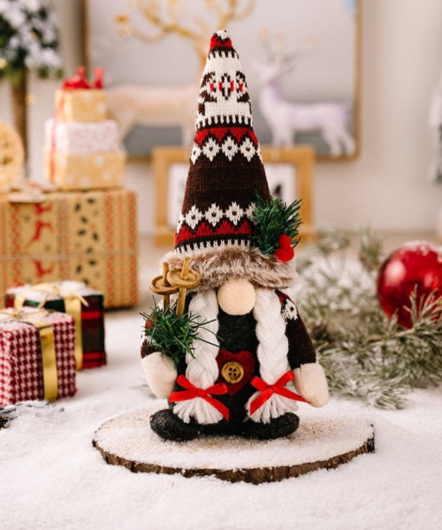 Świąteczny Bożonarodzeniowy skrzat krasnal z długimi warkoczami i kokardkami