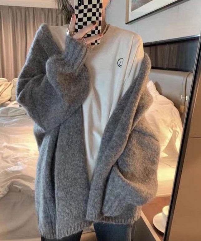 Damski sweter typu kardigan o kroju oversize