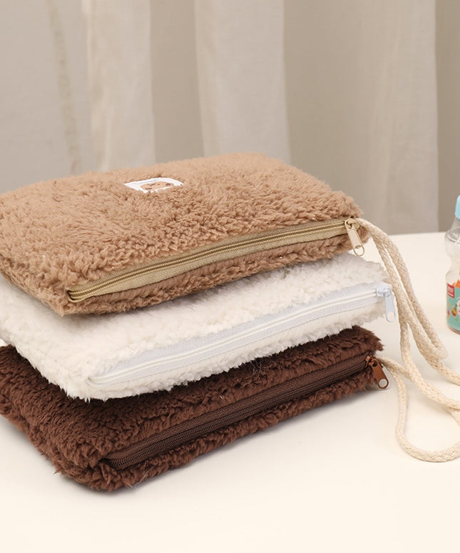 Kosmetyczka pluszowa z uchwytem