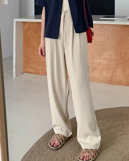 Damskie spodnie chinosy z rozszerzanymi nogawkami i marszczeniem