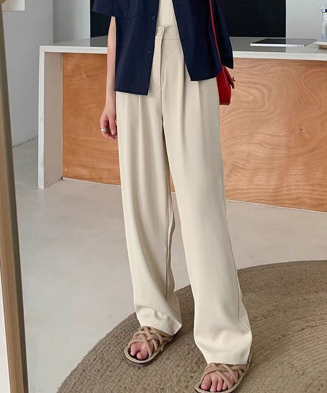 Damskie spodnie chinosy z rozszerzanymi nogawkami i marszczeniem