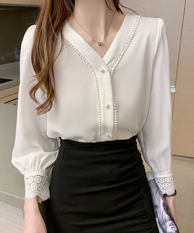 Damska koszula z ażurowymi rękawami