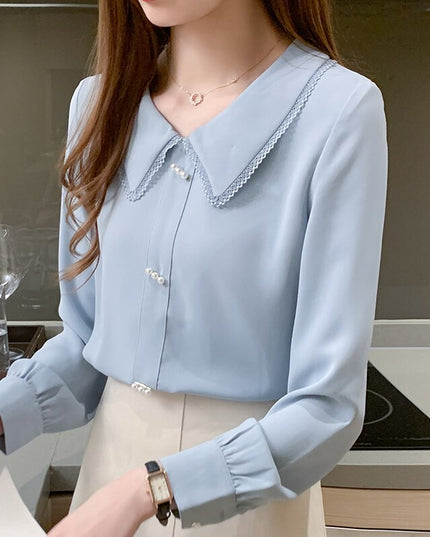 Damska koszula zapinana na perłowe guziki