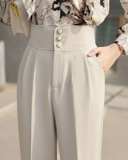 Damskie spodnie chinosy podkreślające talię zapinane na guziki