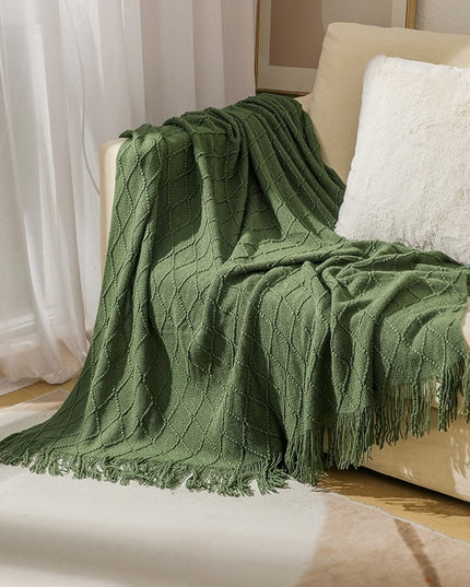 Koc z frędzlami i fakturą w romby