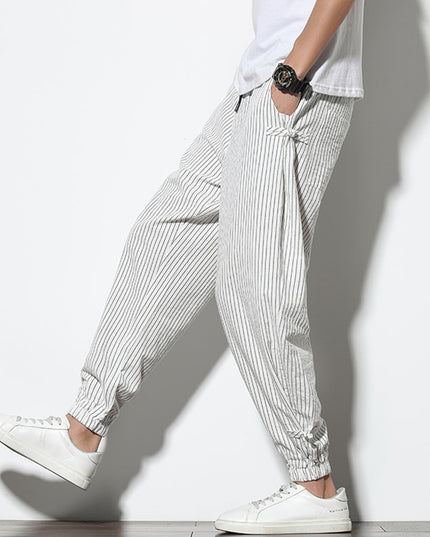 Męskie spodnie treningowe we wzór w paski