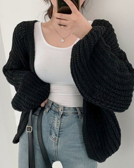 Damski sweter typu kardigan dziergany o kroju oversize