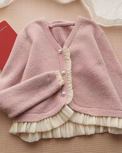 Damski sweter typu kardigan z falbanką