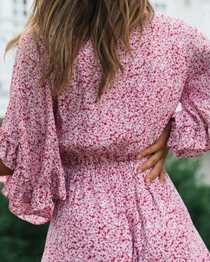 Damski kombinezon w stokrotki z szerokimi rękawami