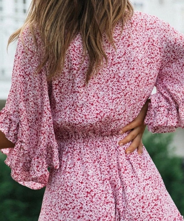 Damski kombinezon w stokrotki z szerokimi rękawami