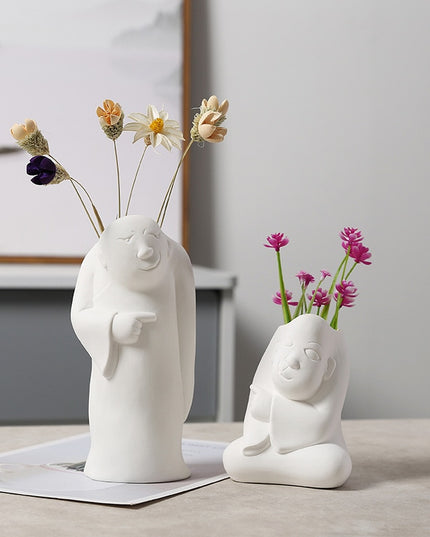 Wazon ceramiczny z motywem twarzy biały