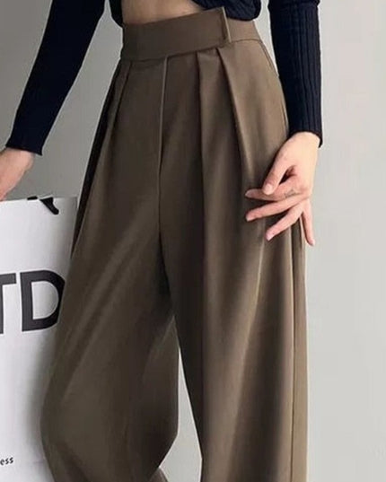Damskie spodnie materiałowe taliowane z szerokimi nogawkami