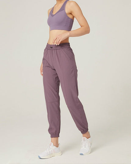 Damskie sportowe spodnie materiałowe z wiązaniem