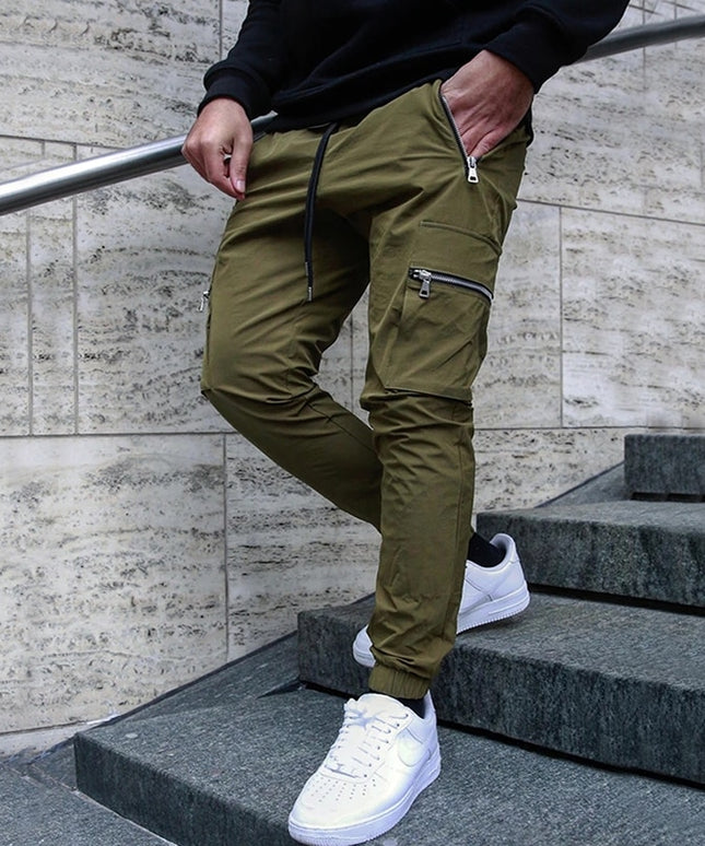 Męskie spodnie bojówki z kieszeniami na suwak