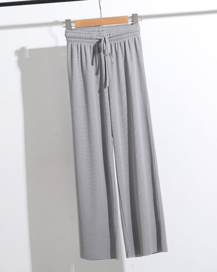 Damskie spodnie z wiązaniem i szerokimi nogawkami