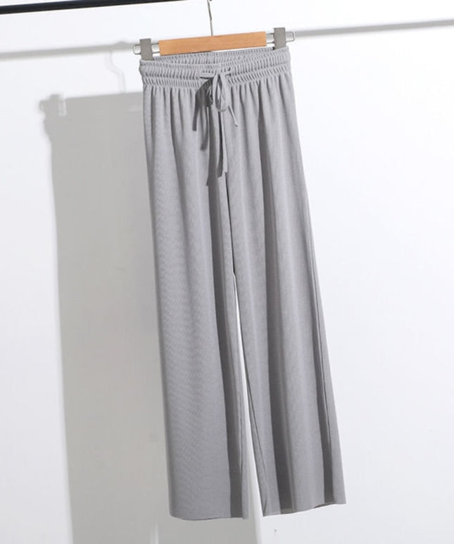 Damskie spodnie z wiązaniem i szerokimi nogawkami