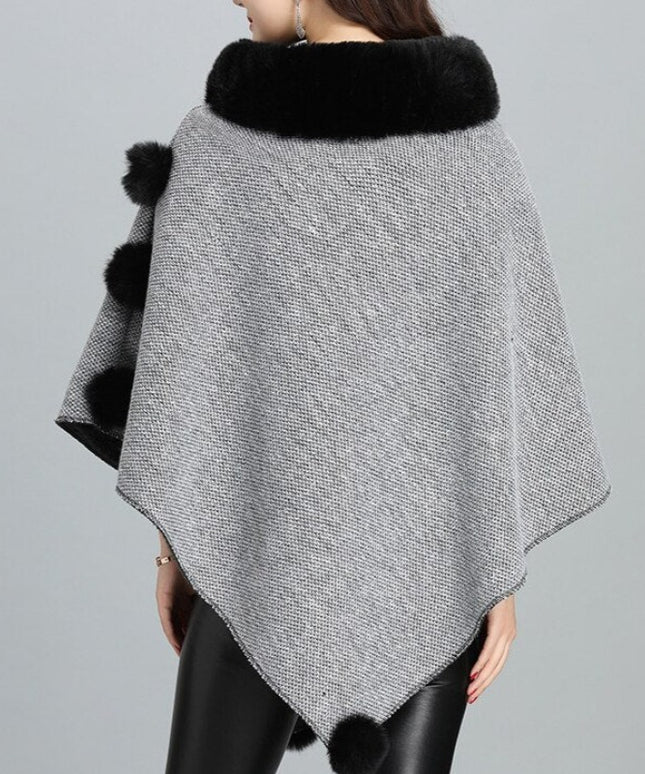 Damski sweter typu ponczo z futerkiem