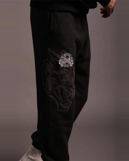 Męskie spodnie treningowe z nadrukiem wilka