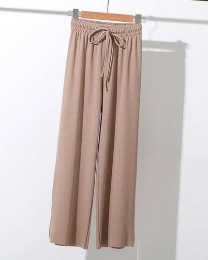 Damskie spodnie z wiązaniem i szerokimi nogawkami